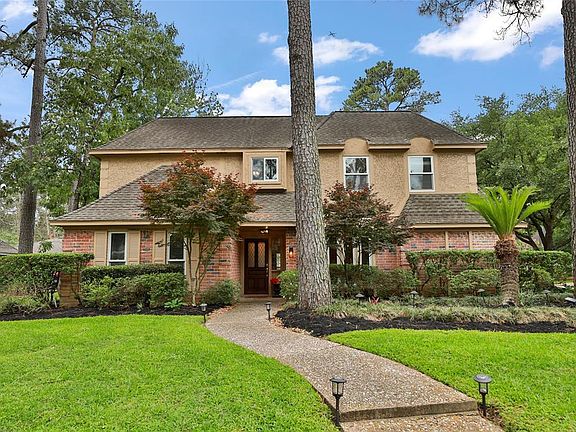 NOTICE THE FULLY GROWN JAPANESE MAPLES THAT ADORN EACH SIDE OF SIDEWALK