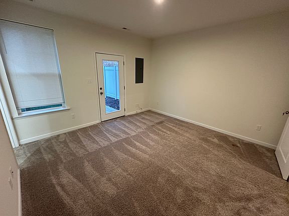 Downstairs bedroom with back yard access