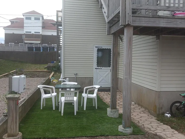 entrance to apartment is in rear of building
