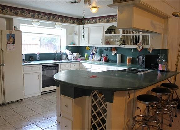 Breakfast bar with built in wine rack.