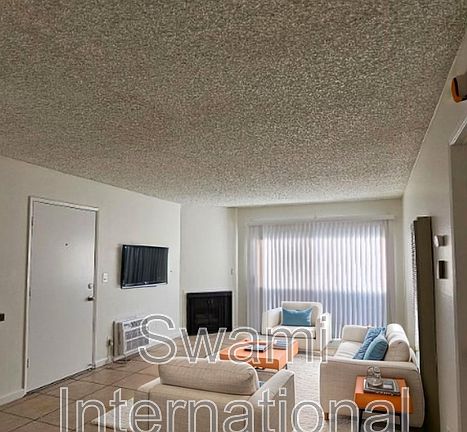 2nd image of 10030 Rosecrans Ave APT 14