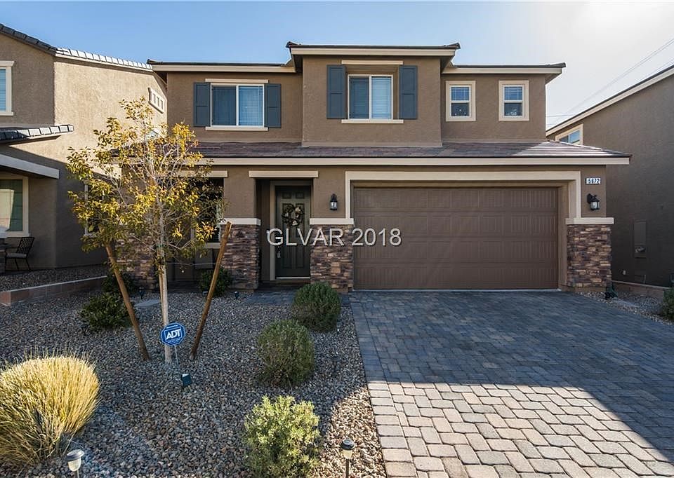 Front Exterior, features pavers - home located near Summerlin