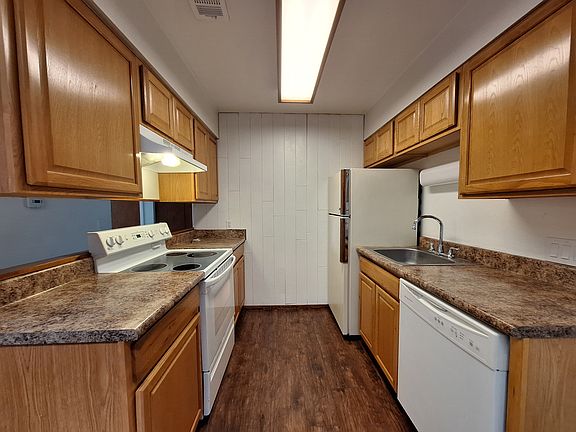 Kitchen 7 ft x 8 ft. Stove, Refrigerator, disposal, dishwasher. Nice countertops and cabinets.