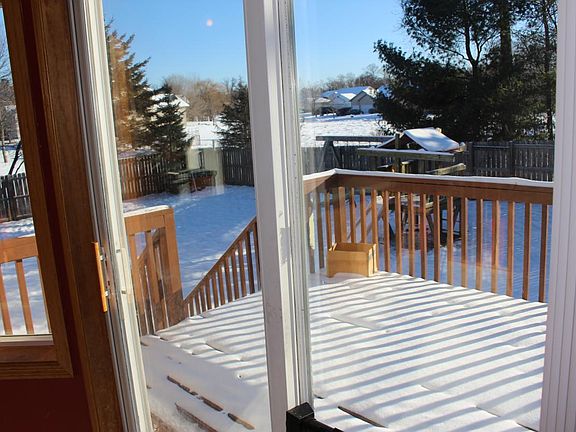 Large walkout deck to fenced backyard