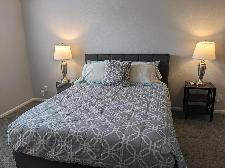 Upstairs is a 3rd Bedroom a second Primary suite with private ensuite bathroom and walk in closet