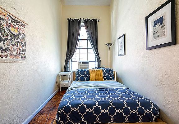 5th image of 210 E 11th St APT D