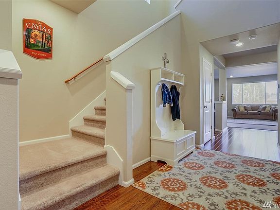 As you enter the home the powder room (half bathroom) is located just inside the door on your left. 
