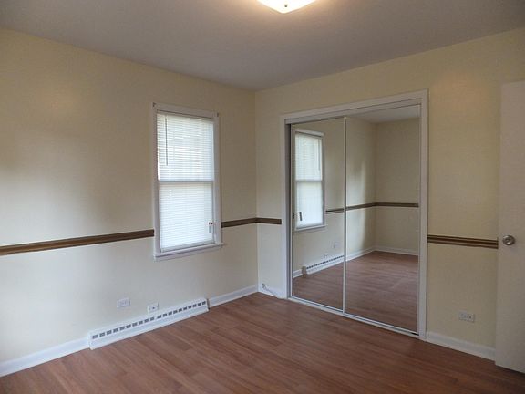 Master bedroom with mirror closet