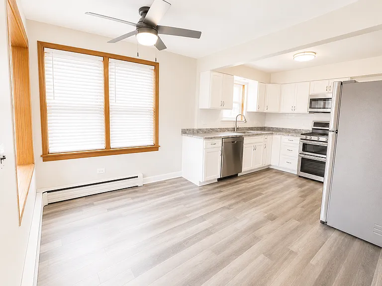 stunning new kitchen with upgraded stainless steel appliances,
