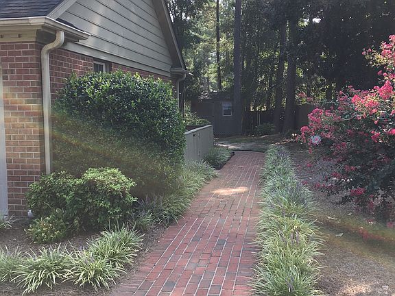 Brick walk to backyard