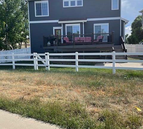 Back yard and a little bit of open space