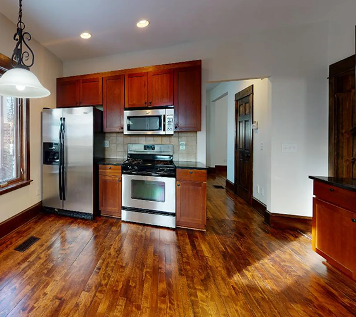 Updated Single-Family Home + 2-Car Garage — Photo 4