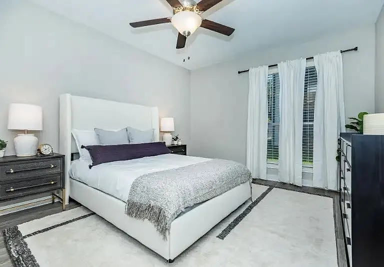 Experience modern living at Cali Crossing Apartments, featuring spacious bedrooms with elegant finishes and ample natural light. Enjoy a serene atmosphere complemented by stylish design. Explore your new home today!