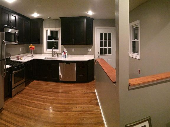 Kitchen view with outside & basement access