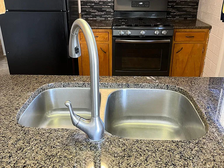 Granite countertops and stainless steel sink