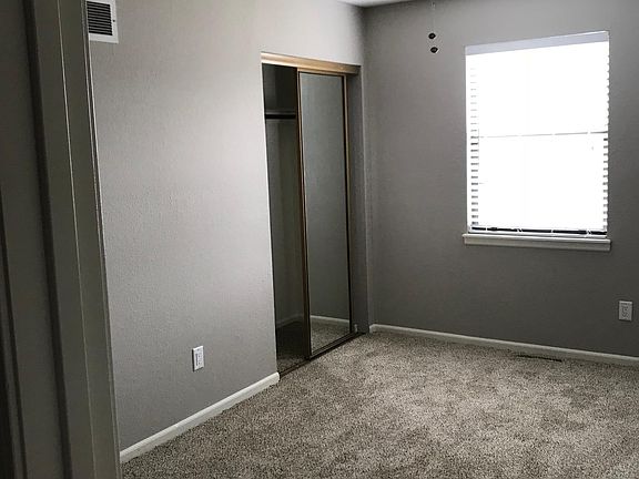 Front bedroom, double closets, new window coverings, new cei
