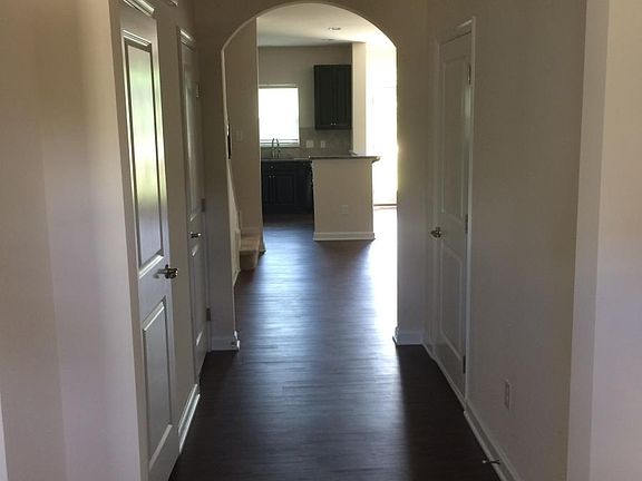 Foyer looking into family room and kitchen