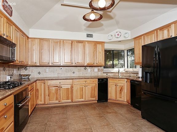 3rd image of 9359 Village Green Way