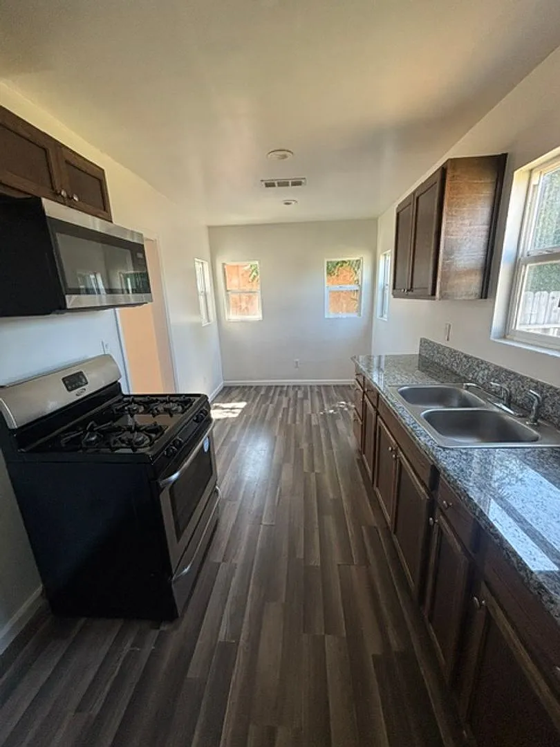 Charming 2 Bedroom, 1 Bathroom Home with Garage & Large Backyard Available Now! — Photo 3