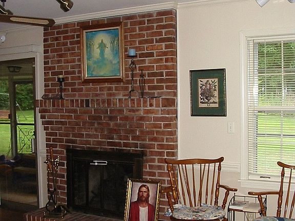 Family room with brick fireplace