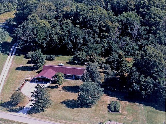 Arial photo of home & surrounding woods