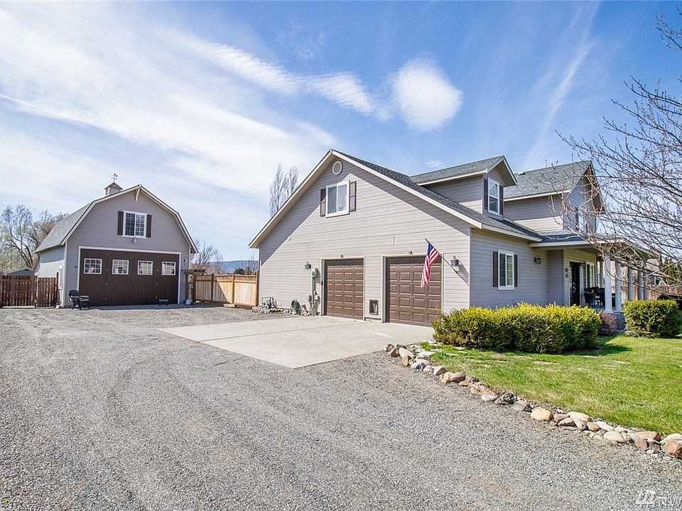 Welcome to the Grasslands! Fantastically well kept 3 bedroom home + bonus room, attached garage, & detached shop, all resting on 1.2 beautifully landscaped acres.