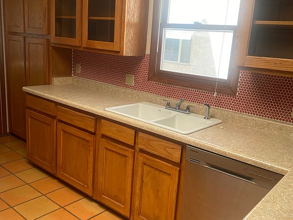 window of kitchen, table top, bar area