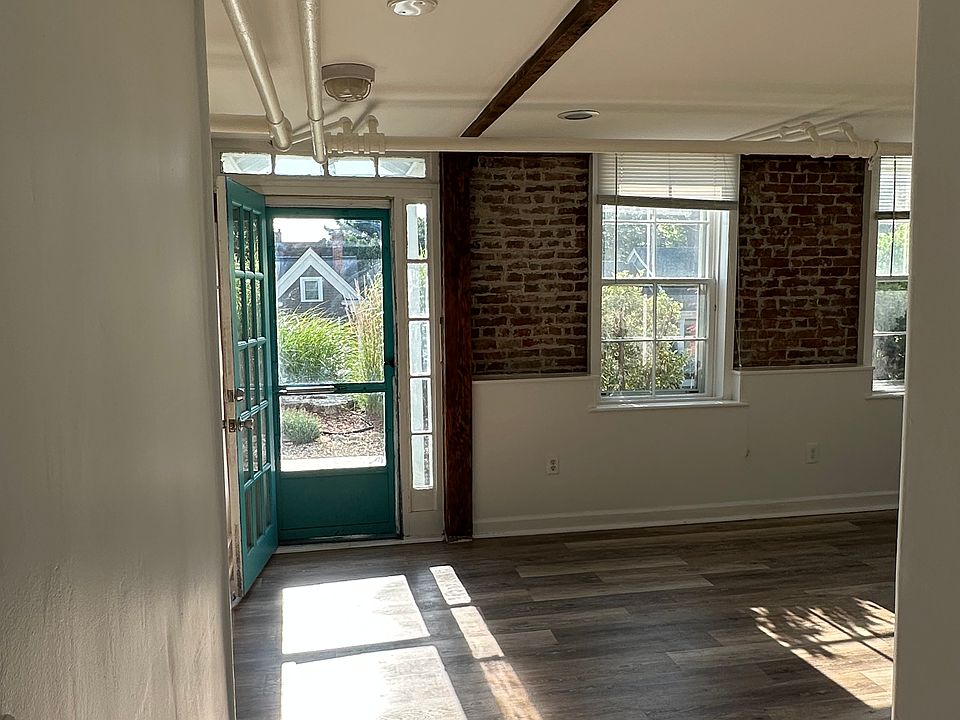 Looking at front entrance from kitchen.