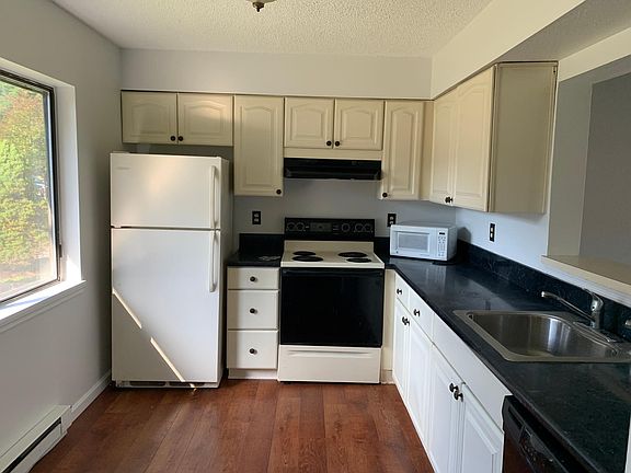 Kitchen with full sight to living area