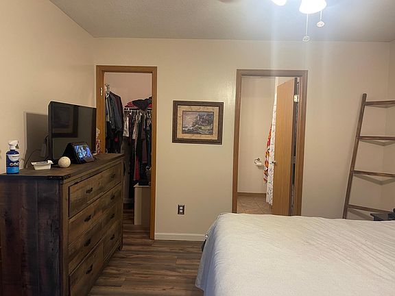 Master bed with closet and bath