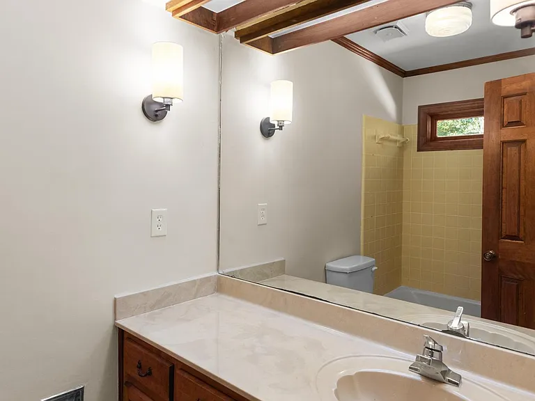 bathroom with adjoining bedroom