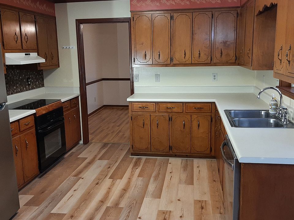 Large kitchen with new flooring
