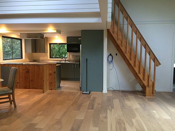 living room and stairs to loft