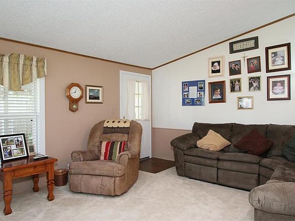 The living area is a great size and offers a beautiful view of Lake Conroe.