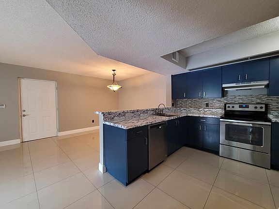 5th image of 18840 NW 57th Ave APT 103