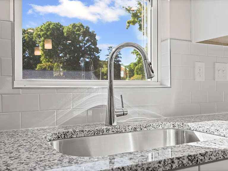 Kitchen with views of the backyard