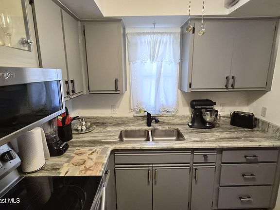 5th image of 921 Sonesta Ave NE APT 202