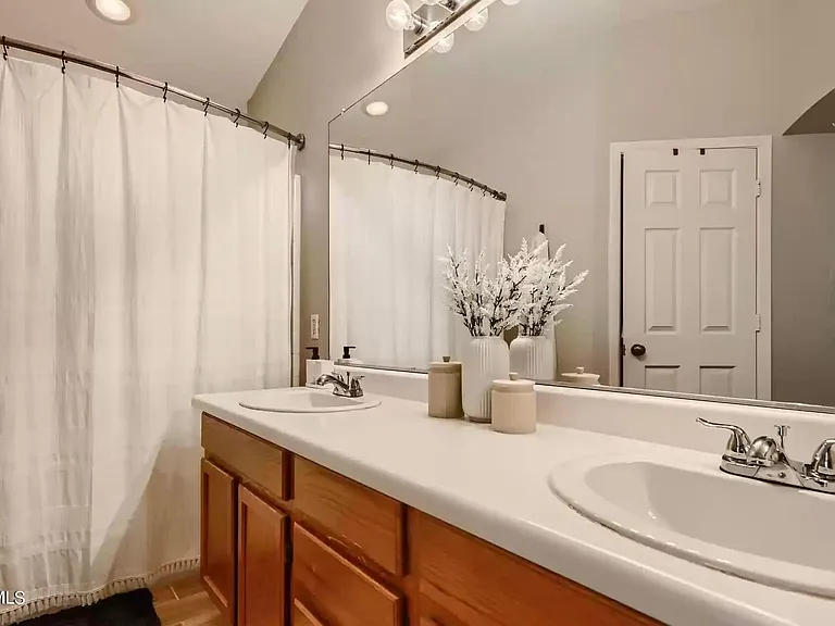 Master Bathroom - double sink, toilet room, and showed/tub combo