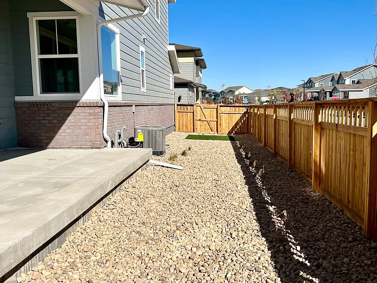 Side yard with large patio.