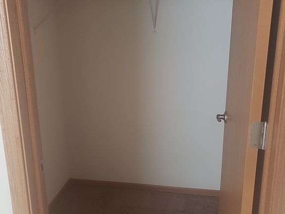 Walk in closet in bedroom