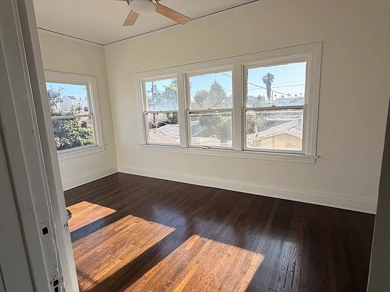 the main bedroom is filled with natural light