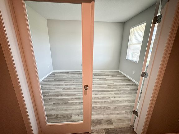 Office with glass french doors.
