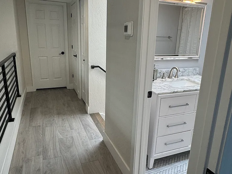 Hall up - guest bath and stairs