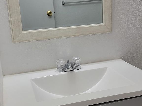New bathroom vanity and mirror.