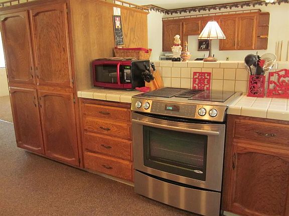 5th image of 54105 Pine Oak Pl