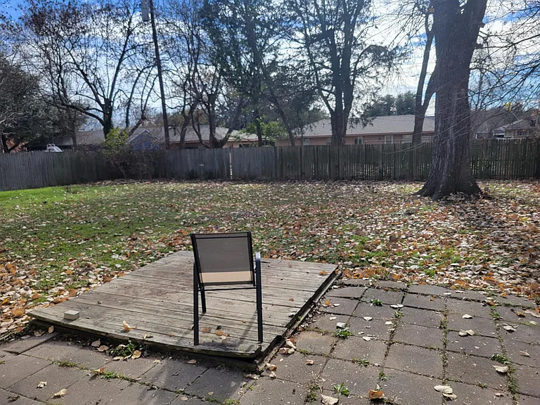 Large fenced back yard.