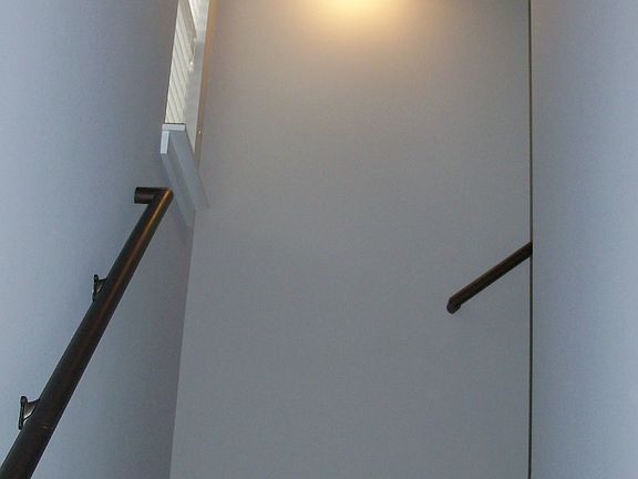 Going up the Carpeted Staircase to the Unit