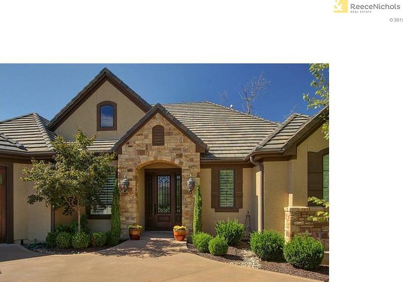 Beautiful custom reverse 1.5 story!