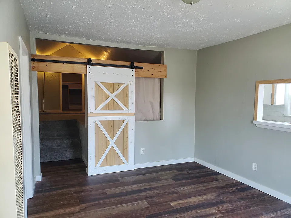 Entrance into bedroom 2, up 3 stairs.