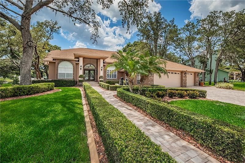 LAVISHLY LANDSCAPED EXTERIOR